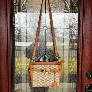 Michael Kors “Hamilton” Traveler Messenger Bag